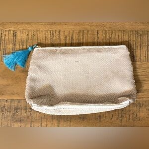 Tarte Cream/Gold Sequined Cosmetic Bag with teal tassels